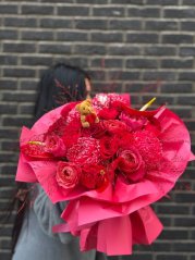 Combination of red rose and anthurium