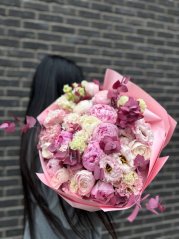 Luxury romantic bouquet of peonies and roses in powdery tones